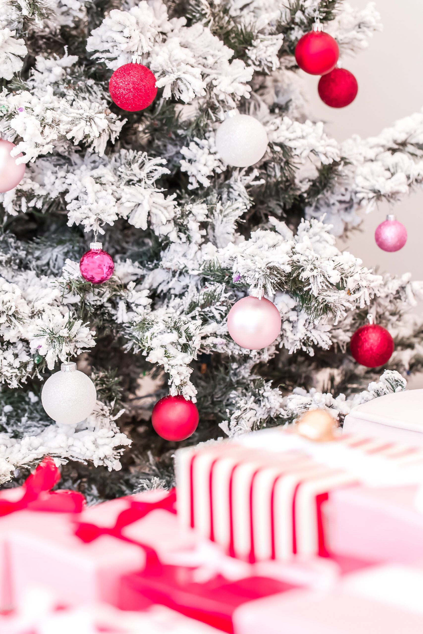 90s christmas tree with red and pink ornaments