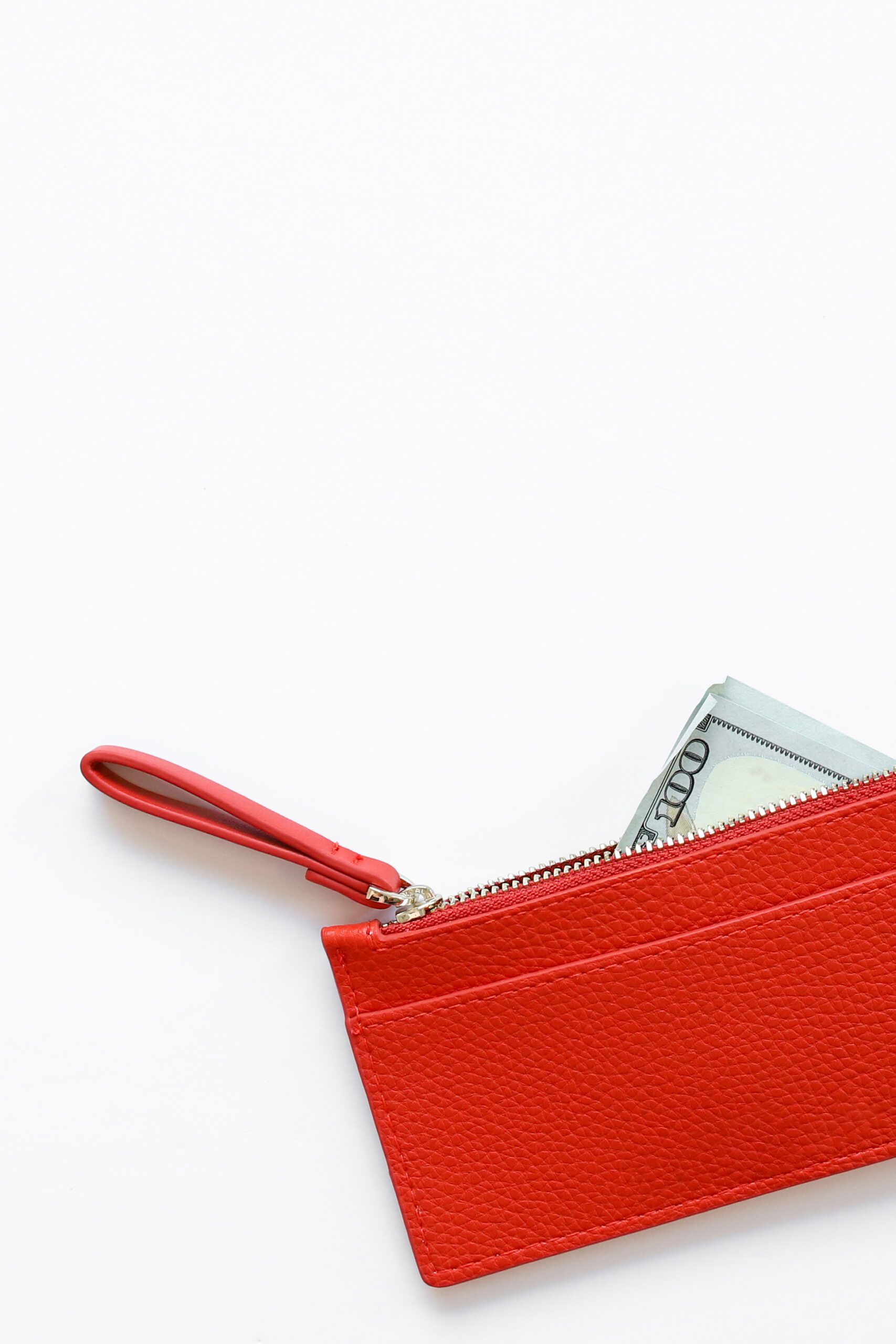 red wallet with money